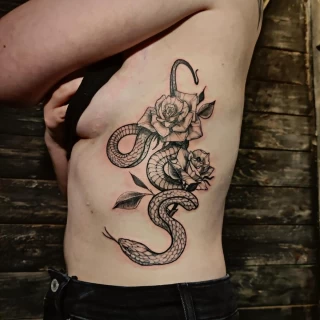 Snake and Roses Tattoo on Side - Black Hat Tattoo Dublin - The Black Hat Tattoo