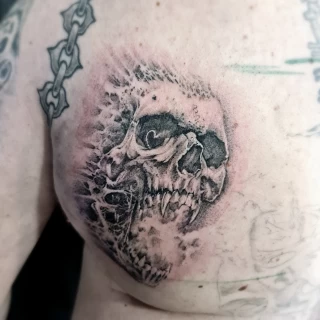 Skull on chest - Skull Tattoo - Black Hat Tattoo Dublin - The Black Hat Tattoo