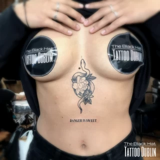 Underboobs snake tattoo - Snake Tattoo - Black Hat Tattoo Dublin - The Black Hat Tattoo